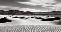 Дюны и облака: фотографирование симметрии в пустыне