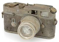 Leica Summicron продается примерно за 2000 долларов